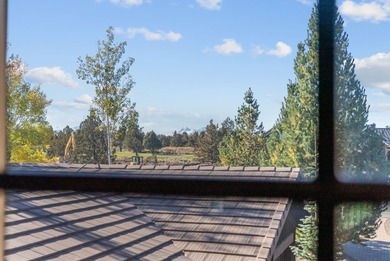 This Sun Forest-built home is perfectly positioned between the on The Club At Pronghorn Golf Course in Oregon - for sale on GolfHomes.com, golf home, golf lot