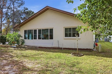 Sweet and solid Sugarmill home featuring a desirable split 2/2 on Sugarmill Woods Golf and Country Club in Florida - for sale on GolfHomes.com, golf home, golf lot