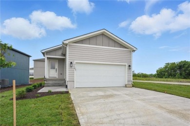 **Live where it feels like you're on vacation every day.** on Golf Club of Creekmoor in Missouri - for sale on GolfHomes.com, golf home, golf lot