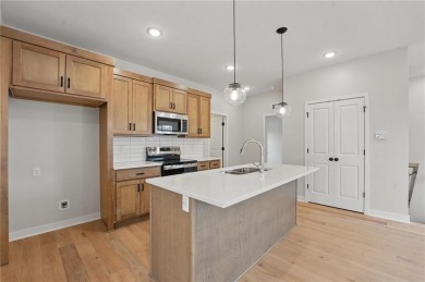 **Live where it feels like you're on vacation every day.** on Golf Club of Creekmoor in Missouri - for sale on GolfHomes.com, golf home, golf lot