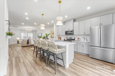 Meticulously maintained 2023 townhome in the highly desirable on Renaissance Park Golf Course in North Carolina - for sale on GolfHomes.com, golf home, golf lot