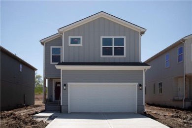 Welcome to this charming 4-bedroom, 2.5-bathroom two-story home on Golf Club of Creekmoor in Missouri - for sale on GolfHomes.com, golf home, golf lot