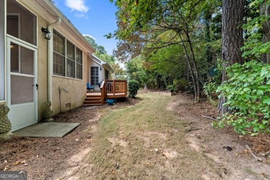 Welcome home to an oasis not too far from the city. Quiet 13 on Canongate At Flat Creek Club in Georgia - for sale on GolfHomes.com, golf home, golf lot