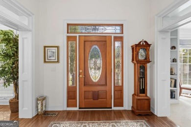 Welcome home to an oasis not too far from the city. Quiet 13 on Canongate At Flat Creek Club in Georgia - for sale on GolfHomes.com, golf home, golf lot