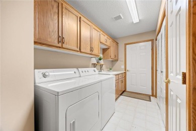 Main Level Living at its; BEST! Spacious and open-concept on Eagle Lake Golf Center in Minnesota - for sale on GolfHomes.com, golf home, golf lot