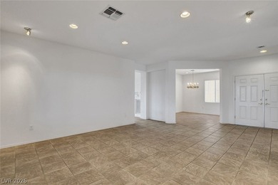 Enjoy spectacular panoramic city, valley and mountain views from on Revere Golf Club in Nevada - for sale on GolfHomes.com, golf home, golf lot