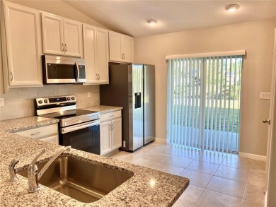Beautiful Duplex with Freshwater Canal View. Located in Cypress on The Grand Club Cypress Course in Florida - for sale on GolfHomes.com, golf home, golf lot