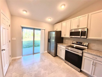 Beautiful Duplex with Freshwater Canal View. Located in Cypress on The Grand Club Cypress Course in Florida - for sale on GolfHomes.com, golf home, golf lot