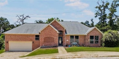 Discover your dream home on the #6 green in Hilltop Lakes! This on Hilltop Lakes Resort Golf Club in Texas - for sale on GolfHomes.com, golf home, golf lot