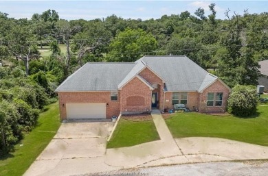 Discover your dream home on the #6 green in Hilltop Lakes! This on Hilltop Lakes Resort Golf Club in Texas - for sale on GolfHomes.com, golf home, golf lot