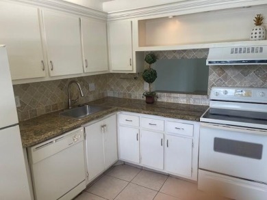 HIGHLY DESIRABLE 1ST FLOOR w/SERENE LAKE VIEWS* 2/2 HOME IN AN on Delray Beach Golf Club in Florida - for sale on GolfHomes.com, golf home, golf lot