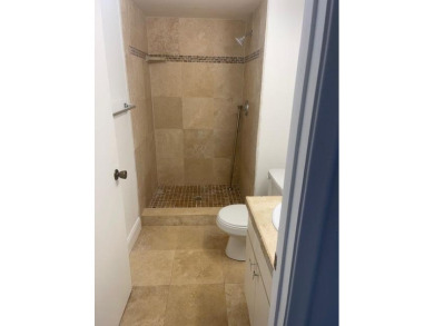 HIGHLY DESIRABLE 1ST FLOOR w/SERENE LAKE VIEWS* 2/2 HOME IN AN on Delray Beach Golf Club in Florida - for sale on GolfHomes.com, golf home, golf lot