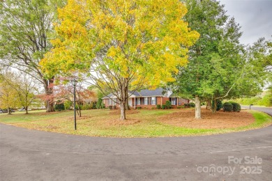 Just a short walk from The Gaston Country Club, you will find on Gaston Country Club in North Carolina - for sale on GolfHomes.com, golf home, golf lot