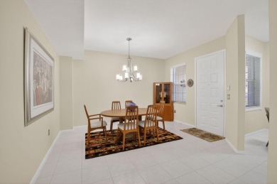 Updated, Beautiful lake view first floor  Villa/coach home on Westchester Golf and Country Club in Florida - for sale on GolfHomes.com, golf home, golf lot