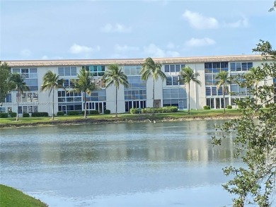 GATED COMMUNITY! ONE BED ONE BATH CONDO WITH LAKE VIEW FROM BACK on Wynmoor Golf Course in Florida - for sale on GolfHomes.com, golf home, golf lot