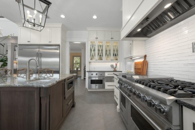 Located on the 13th hole with panoramic views of both the 12th on Haile Plantation Golf and Country Club in Florida - for sale on GolfHomes.com, golf home, golf lot