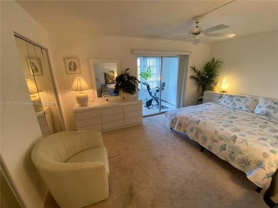 GATED COMMUNITY! ONE BED ONE BATH CONDO WITH LAKE VIEW FROM BACK on Wynmoor Golf Course in Florida - for sale on GolfHomes.com, golf home, golf lot