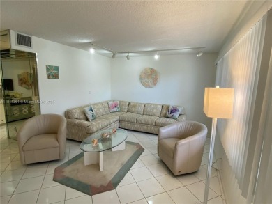 GATED COMMUNITY! ONE BED ONE BATH CONDO WITH LAKE VIEW FROM BACK on Wynmoor Golf Course in Florida - for sale on GolfHomes.com, golf home, golf lot