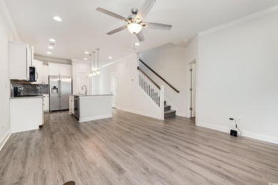 Welcome to this stunning 4-bedroom, 2.5-bathroom townhome on Barefoot Resort and Golf Club  in South Carolina - for sale on GolfHomes.com, golf home, golf lot