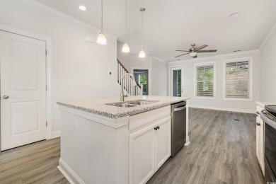 Welcome to this stunning 4-bedroom, 2.5-bathroom townhome on Barefoot Resort and Golf Club  in South Carolina - for sale on GolfHomes.com, golf home, golf lot