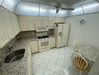 GATED COMMUNITY! ONE BED ONE BATH CONDO WITH LAKE VIEW FROM BACK on Wynmoor Golf Course in Florida - for sale on GolfHomes.com, golf home, golf lot
