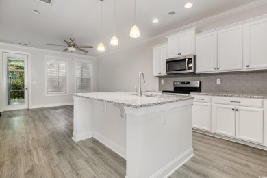 Welcome to this stunning 4-bedroom, 2.5-bathroom townhome on Barefoot Resort and Golf Club  in South Carolina - for sale on GolfHomes.com, golf home, golf lot
