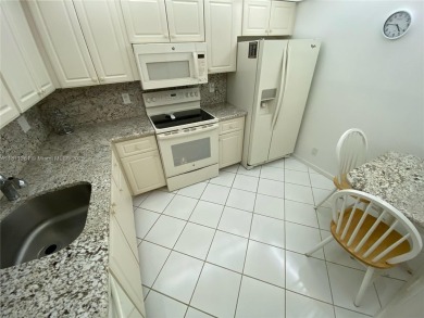 GATED COMMUNITY! ONE BED ONE BATH CONDO WITH LAKE VIEW FROM BACK on Wynmoor Golf Course in Florida - for sale on GolfHomes.com, golf home, golf lot