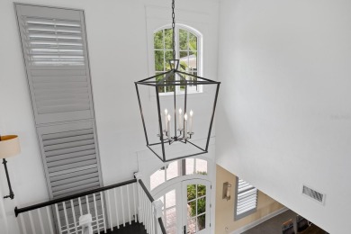 Located on the 13th hole with panoramic views of both the 12th on Haile Plantation Golf and Country Club in Florida - for sale on GolfHomes.com, golf home, golf lot