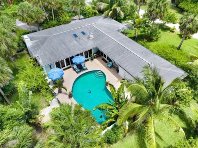 Elegant Mid-Century Modern Treasure with Timeless on Crane Creek Reserve Golf Club in Florida - for sale on GolfHomes.com, golf home, golf lot