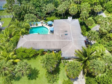 Elegant Mid-Century Modern Treasure with Timeless on Crane Creek Reserve Golf Club in Florida - for sale on GolfHomes.com, golf home, golf lot
