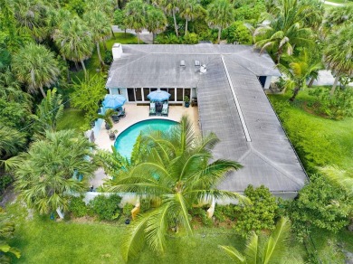 Elegant Mid-Century Modern Treasure with Timeless on Crane Creek Reserve Golf Club in Florida - for sale on GolfHomes.com, golf home, golf lot