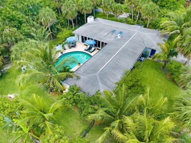 Elegant Mid-Century Modern Treasure with Timeless on Crane Creek Reserve Golf Club in Florida - for sale on GolfHomes.com, golf home, golf lot