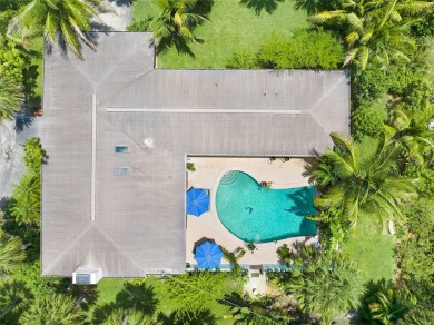 Elegant Mid-Century Modern Treasure with Timeless on Crane Creek Reserve Golf Club in Florida - for sale on GolfHomes.com, golf home, golf lot