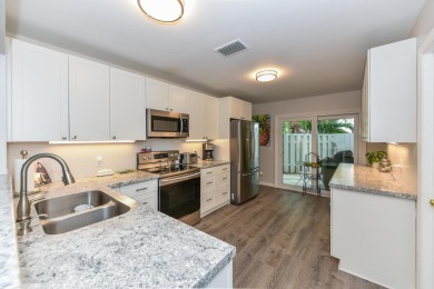 This 3BR/3BA luxurious townhome situated in the sought after on Eagle Wood Golf Course in Florida - for sale on GolfHomes.com, golf home, golf lot