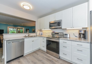 This 3BR/3BA luxurious townhome situated in the sought after on Eagle Wood Golf Course in Florida - for sale on GolfHomes.com, golf home, golf lot