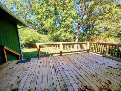 Picture yourself sitting on this deck, overlooking your nice big on The Course At Turkey Mountain in Arkansas - for sale on GolfHomes.com, golf home, golf lot