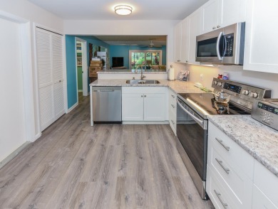 This 3BR/3BA luxurious townhome situated in the sought after on Eagle Wood Golf Course in Florida - for sale on GolfHomes.com, golf home, golf lot