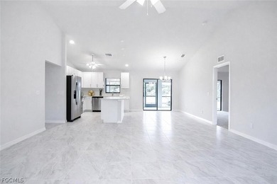 This is a MUST SEE! BRAND NEW WATERFRONT HOME WITH 4 BEDROOMS, 2 on Del Tura Golf and Country Club in Florida - for sale on GolfHomes.com, golf home, golf lot