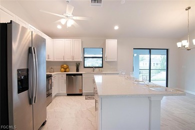 This is a MUST SEE! BRAND NEW WATERFRONT HOME WITH 4 BEDROOMS, 2 on Del Tura Golf and Country Club in Florida - for sale on GolfHomes.com, golf home, golf lot