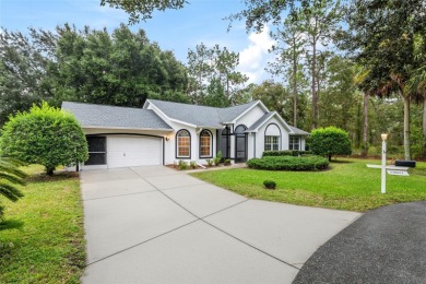 Welcome home to your little sanctuary tucked along the edge of a on Royal Oaks Golf Club in Florida - for sale on GolfHomes.com, golf home, golf lot