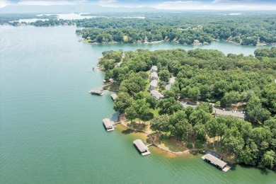 Enjoy beautiful Smith Mountain Lake in the worry free community on The Waterfront Country Club in Virginia - for sale on GolfHomes.com, golf home, golf lot