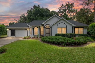 Welcome home to your little sanctuary tucked along the edge of a on Royal Oaks Golf Club in Florida - for sale on GolfHomes.com, golf home, golf lot