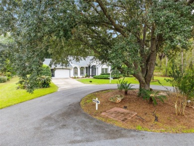 Welcome home to your little sanctuary tucked along the edge of a on Royal Oaks Golf Club in Florida - for sale on GolfHomes.com, golf home, golf lot