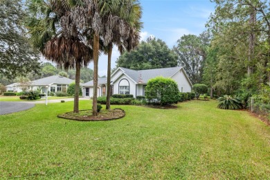 Welcome home to your little sanctuary tucked along the edge of a on Royal Oaks Golf Club in Florida - for sale on GolfHomes.com, golf home, golf lot