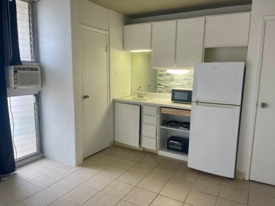 Fee simple affordable top floor efficiency studio condo with on Ala Wai Golf Course in Hawaii - for sale on GolfHomes.com, golf home, golf lot