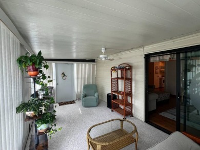 Welcome to this well-maintained 2-bedroom, 2-bath home offering on Lake Henry Golf Club in Florida - for sale on GolfHomes.com, golf home, golf lot