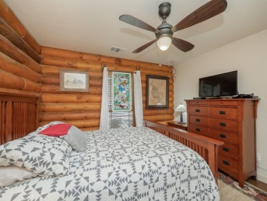 This stunning log cabin features 3 bedrooms, 2 bathrooms, and on Lago Vista Golf Club in Texas - for sale on GolfHomes.com, golf home, golf lot