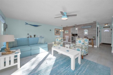 WELCOME TO DUNEDIN'S WATERFRONT COMMUNITY OF MEDITERRANEAN on The Dunedin Country Club in Florida - for sale on GolfHomes.com, golf home, golf lot