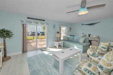 WELCOME TO DUNEDIN'S WATERFRONT COMMUNITY OF MEDITERRANEAN on The Dunedin Country Club in Florida - for sale on GolfHomes.com, golf home, golf lot