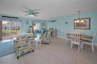 WELCOME TO DUNEDIN'S WATERFRONT COMMUNITY OF MEDITERRANEAN on The Dunedin Country Club in Florida - for sale on GolfHomes.com, golf home, golf lot